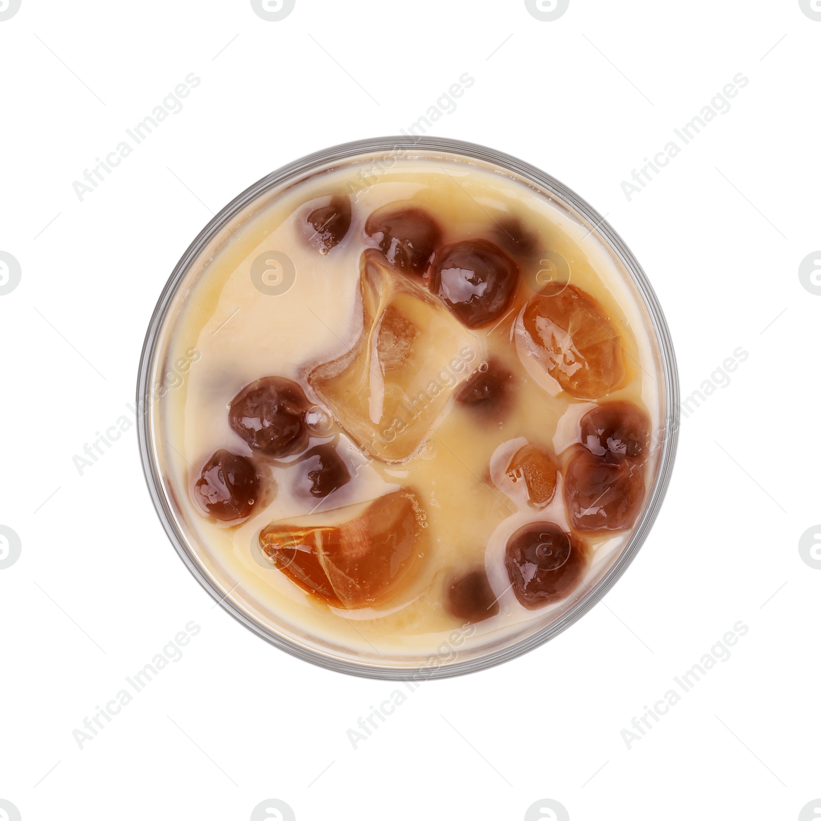 Photo of Tasty milk bubble tea in glass isolated on white, top view