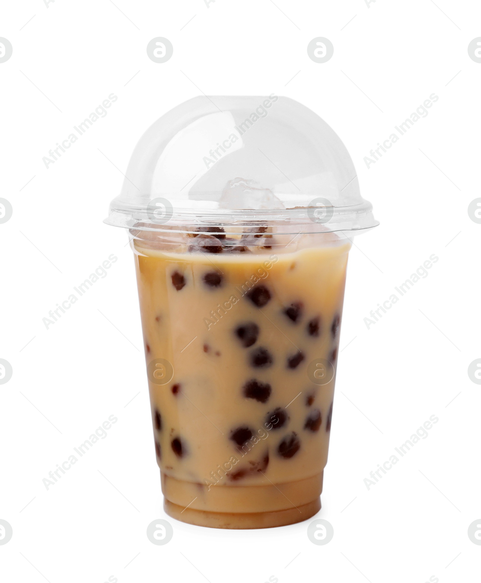 Photo of Tasty milk bubble tea in plastic cup isolated on white