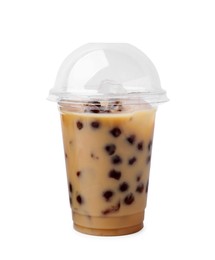 Photo of Tasty milk bubble tea in plastic cup isolated on white