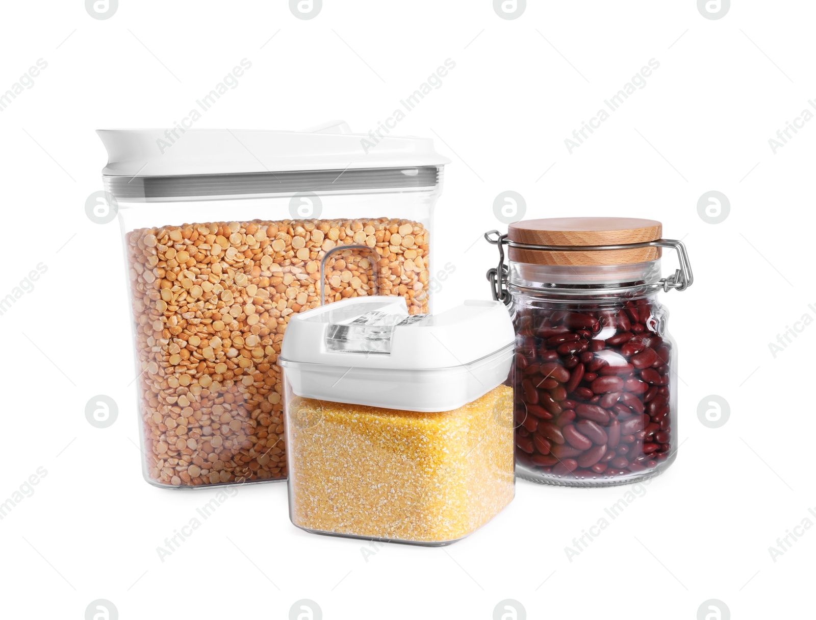 Photo of Different types of cereals and legumes in containers isolated on white