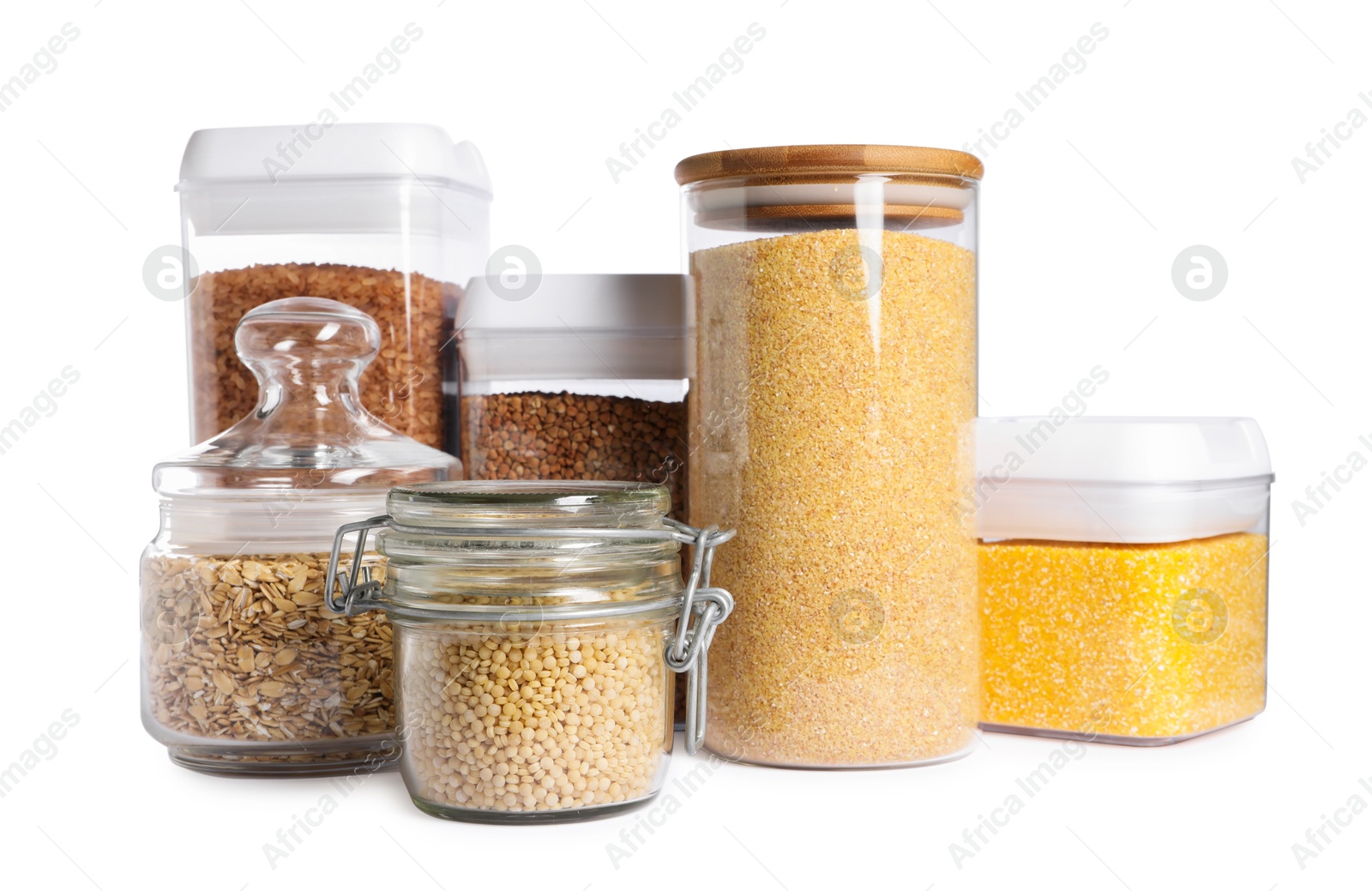 Photo of Different types of cereals in containers isolated on white