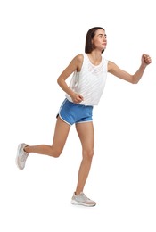 Beautiful young woman running on white background