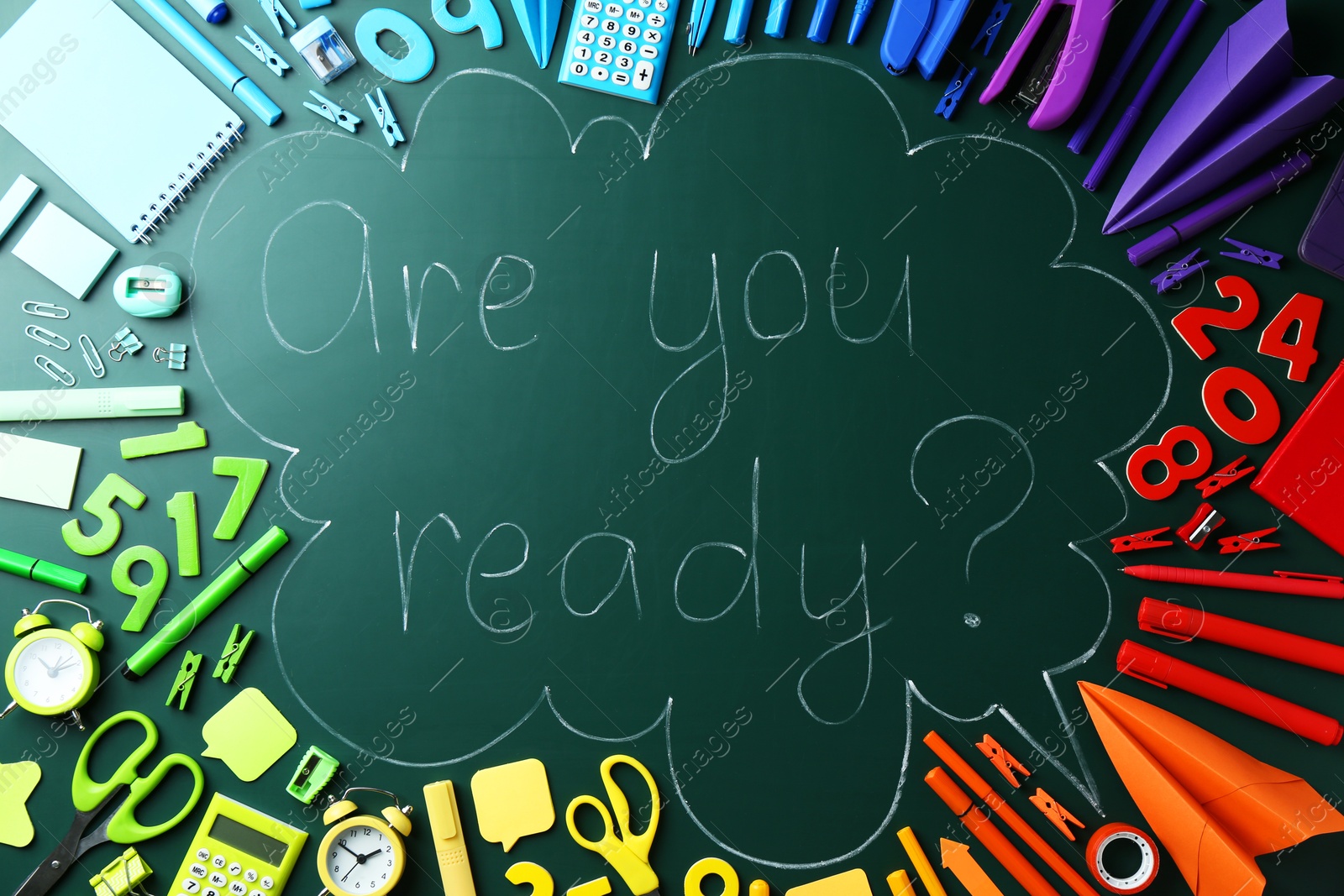 Photo of Chalkboard with question Are You Ready and stationery, flat lay