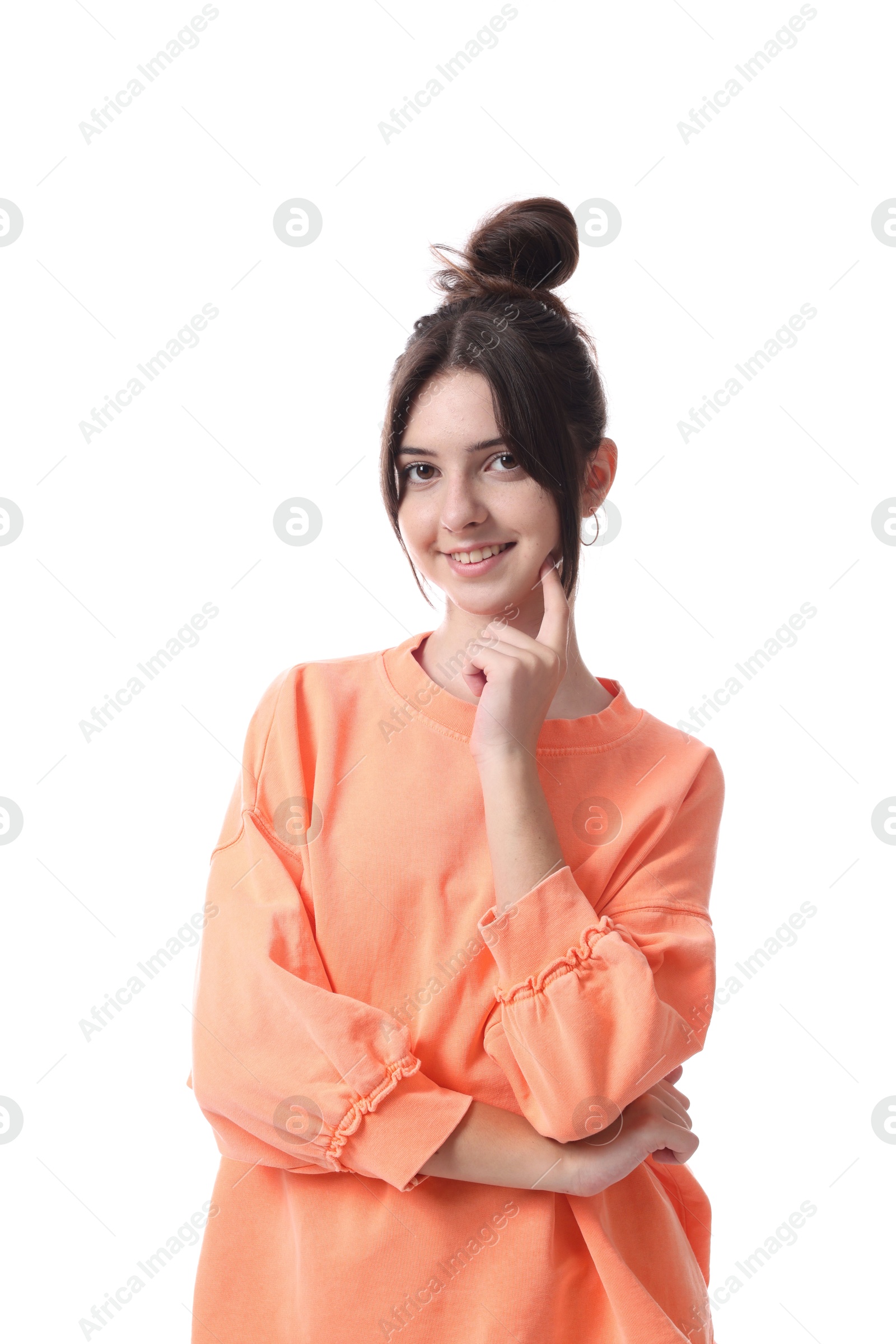 Photo of Portrait of smiling teenage girl on white background