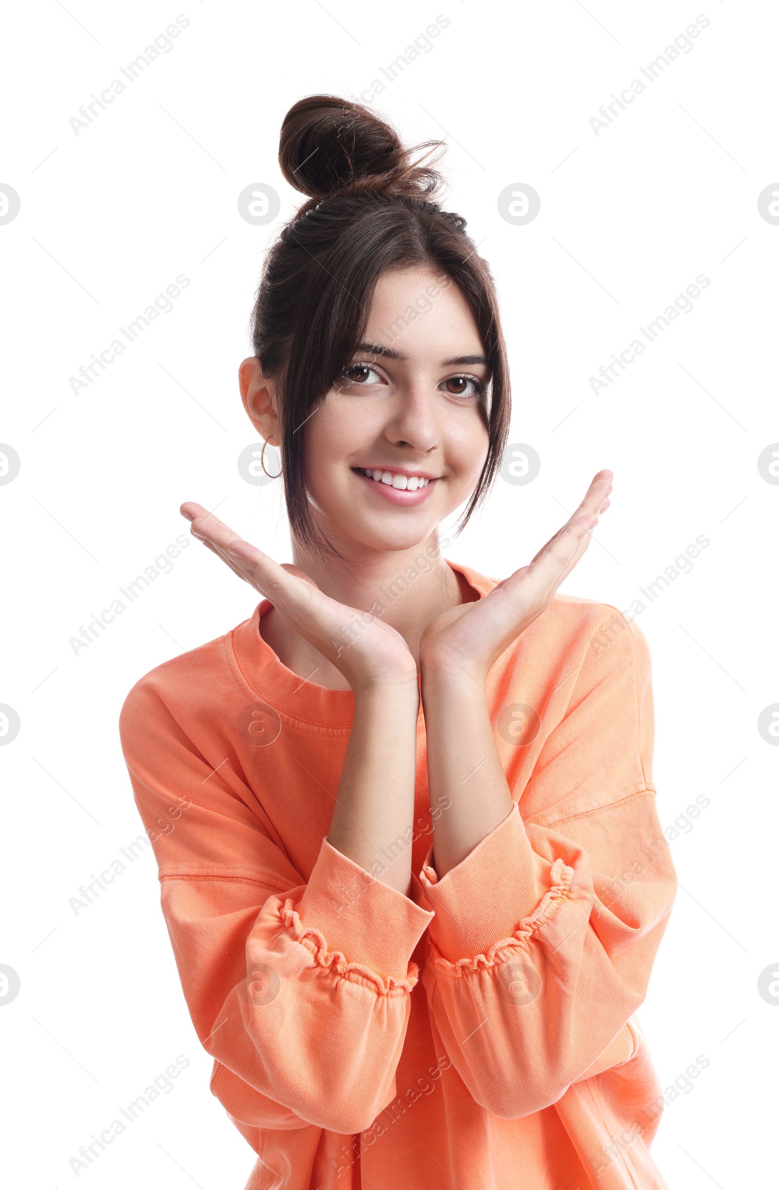 Photo of Portrait of smiling teenage girl on white background