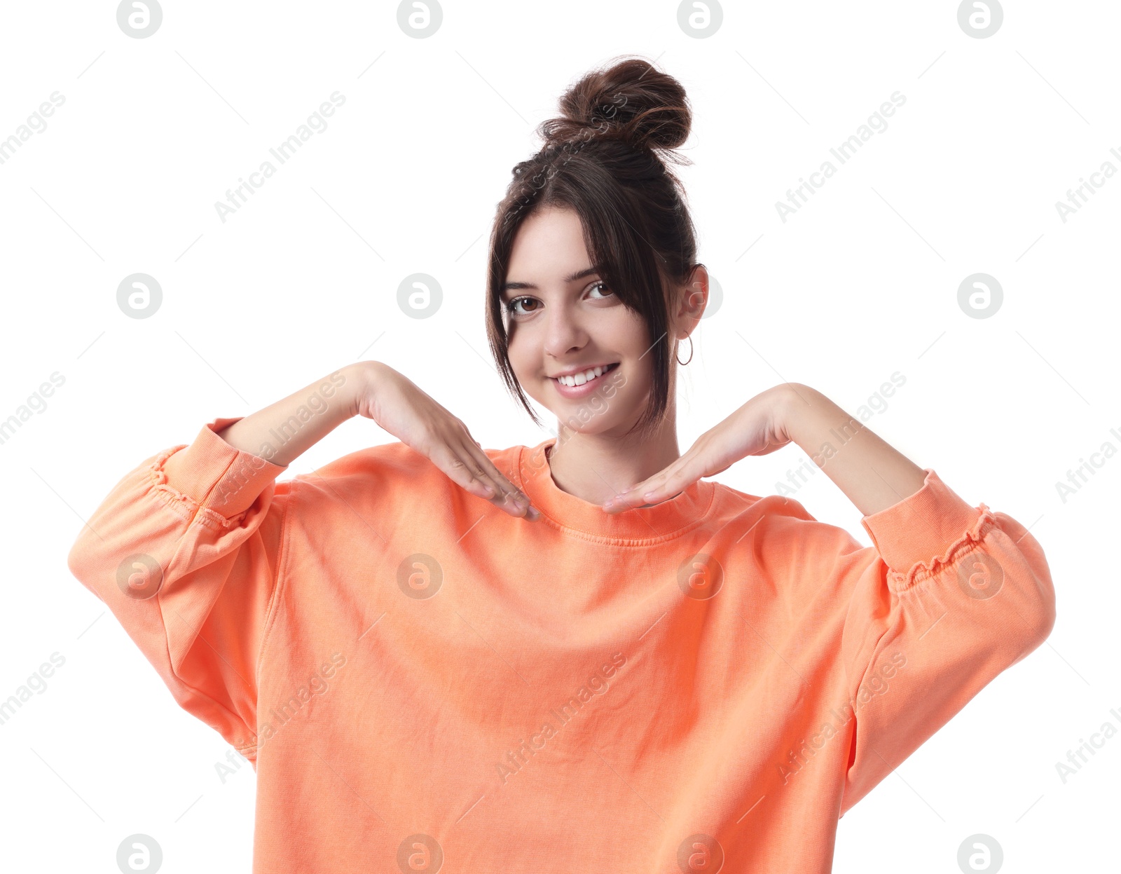 Photo of Portrait of smiling teenage girl on white background