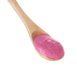 Photo of Tasty beetroot hummus in wooden spoon isolated on white