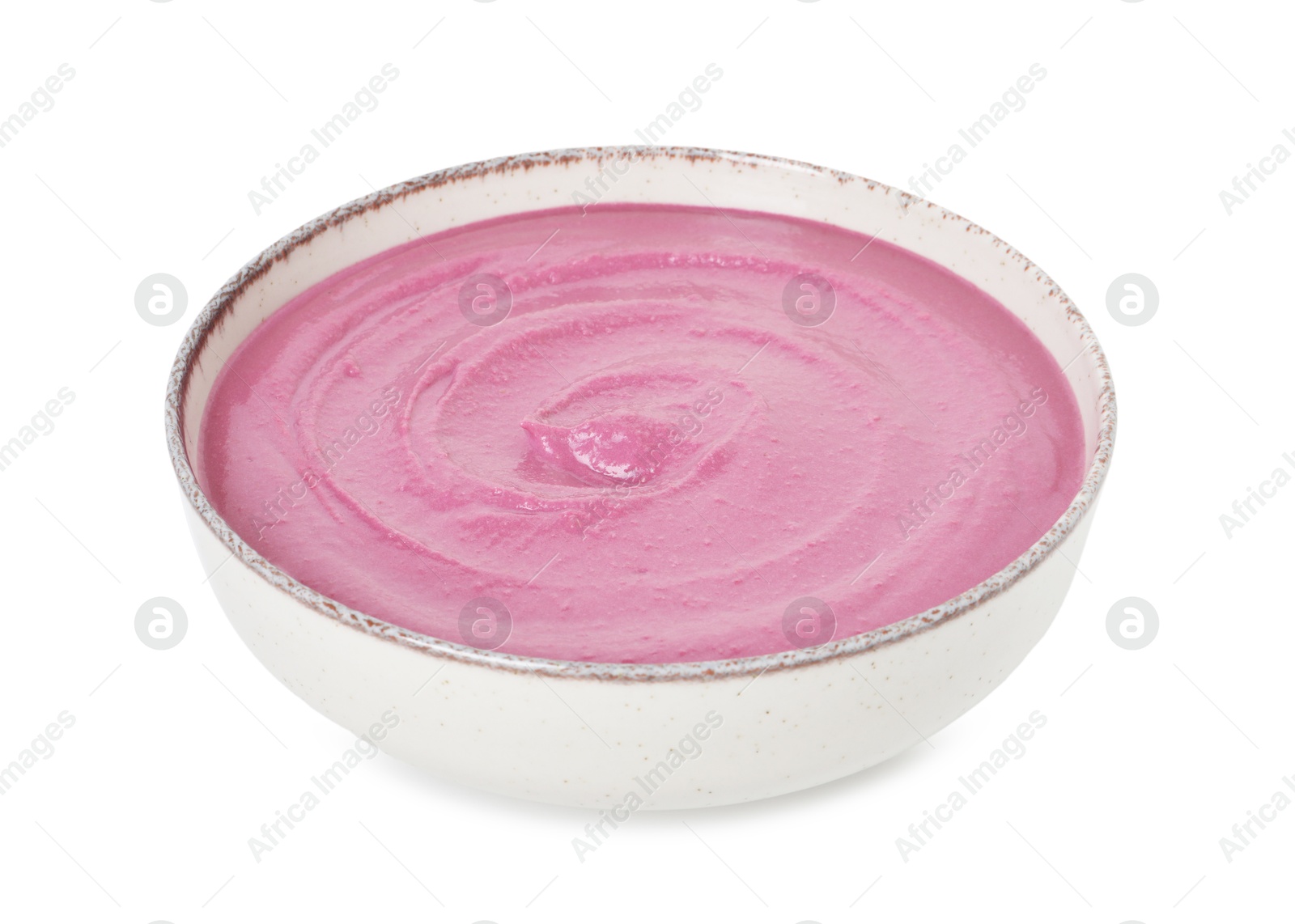 Photo of Tasty beetroot hummus in bowl isolated on white