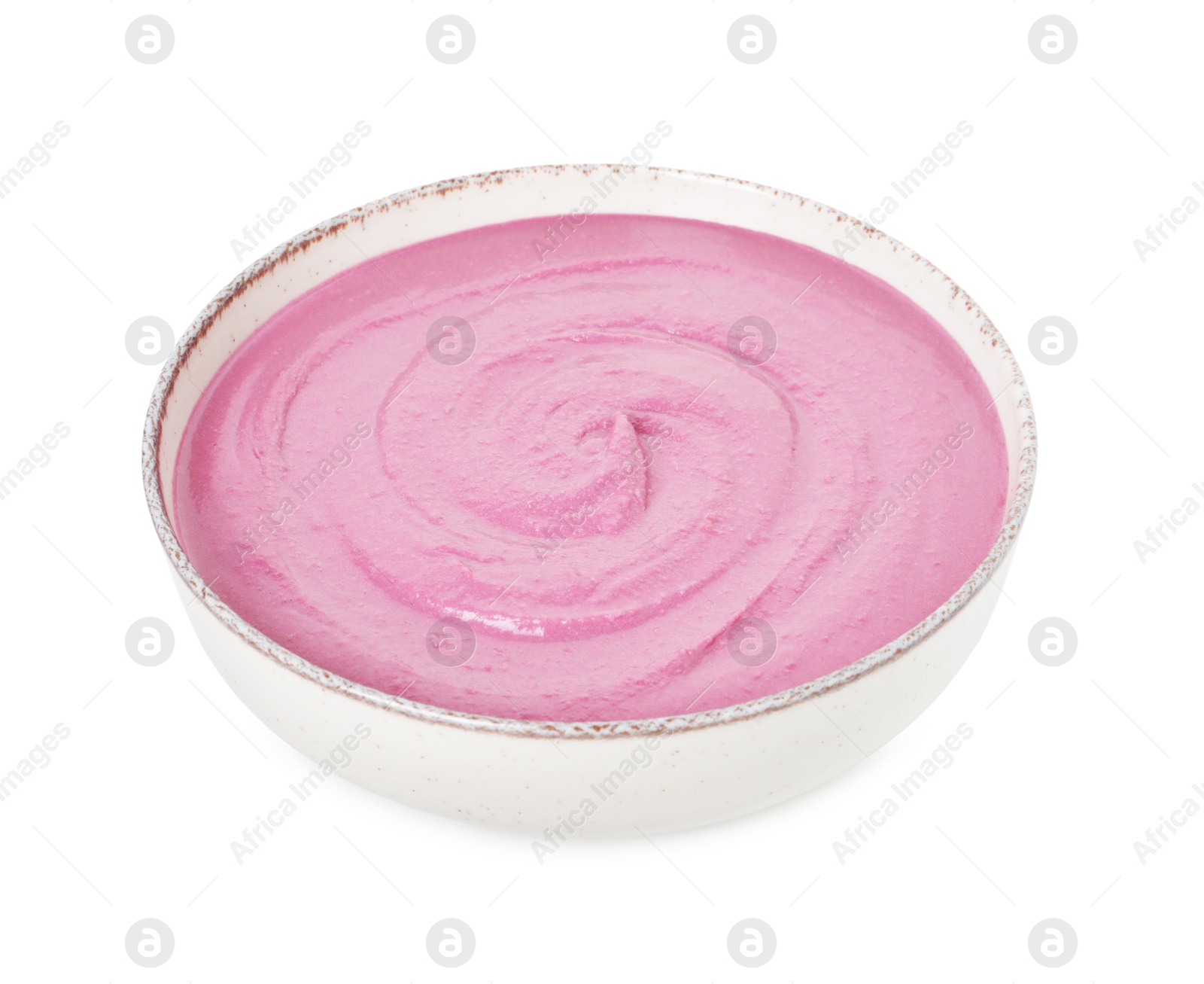 Photo of Tasty beetroot hummus in bowl isolated on white