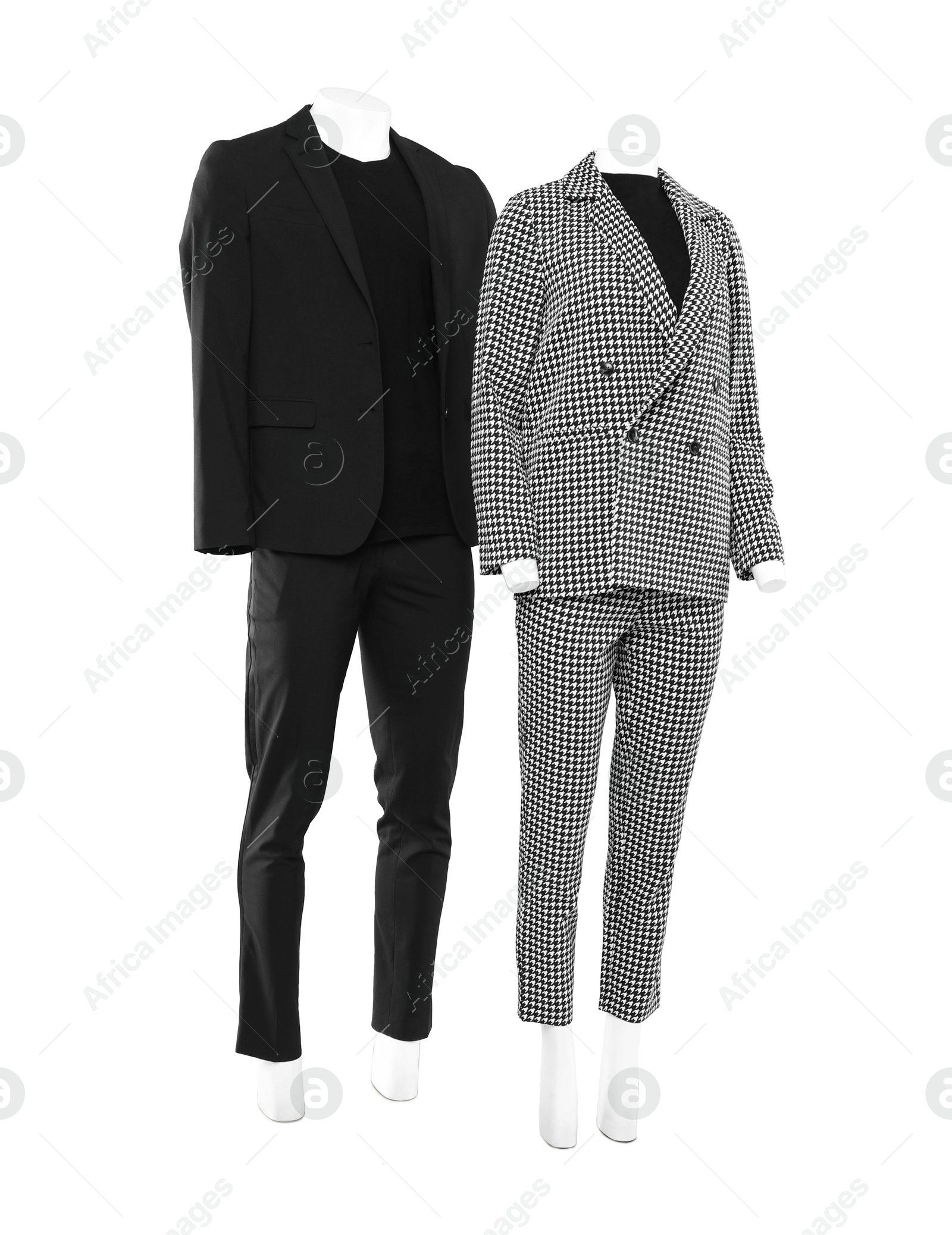 Photo of Female and male mannequins with stylish outfits isolated on white