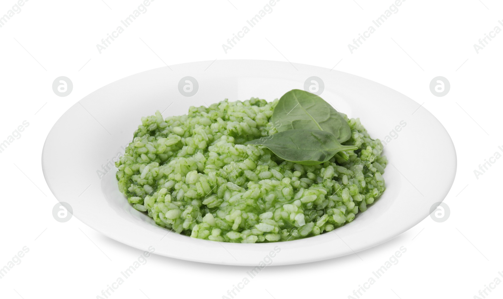 Photo of Delicious spinach risotto in plate isolated on white