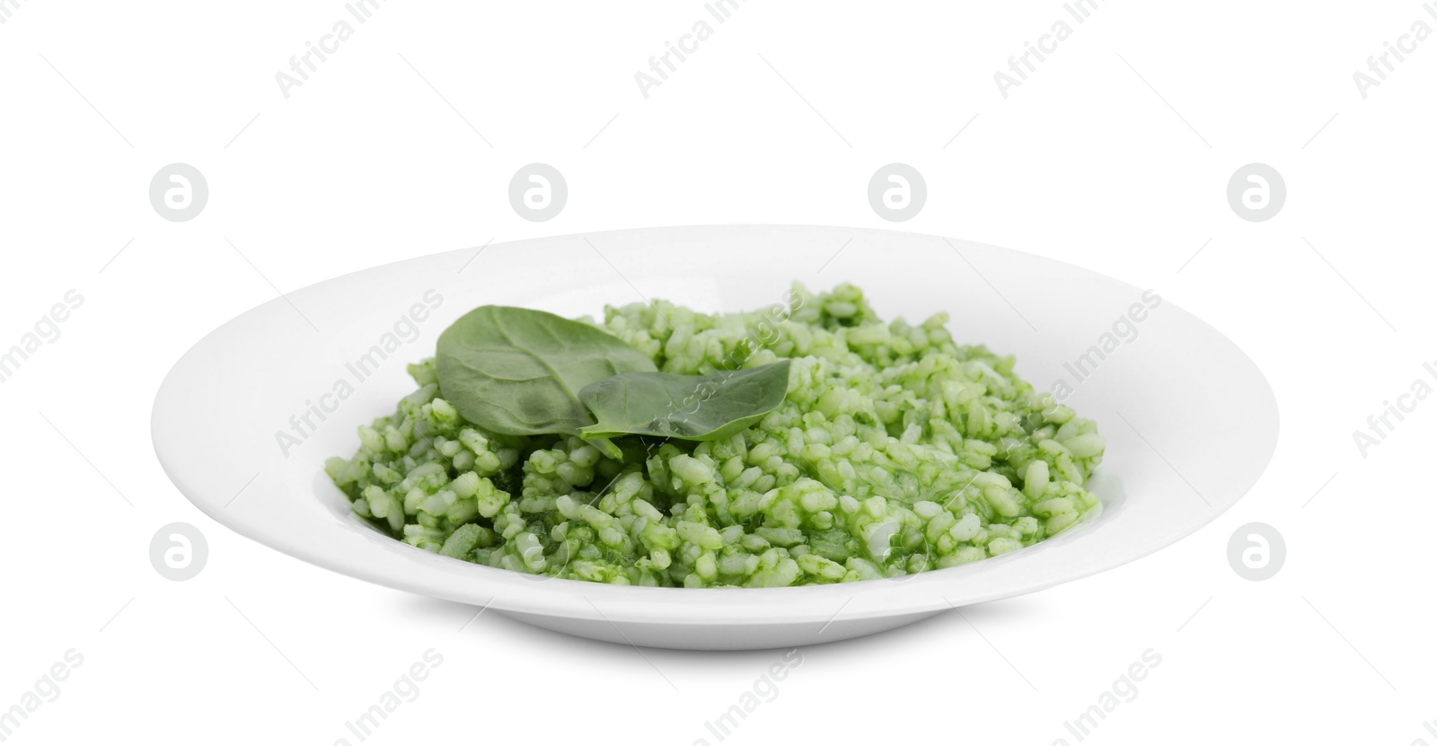 Photo of Delicious spinach risotto in plate isolated on white