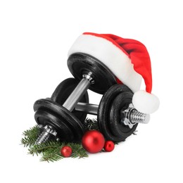 Photo of Dumbbells and Christmas decor isolated on white