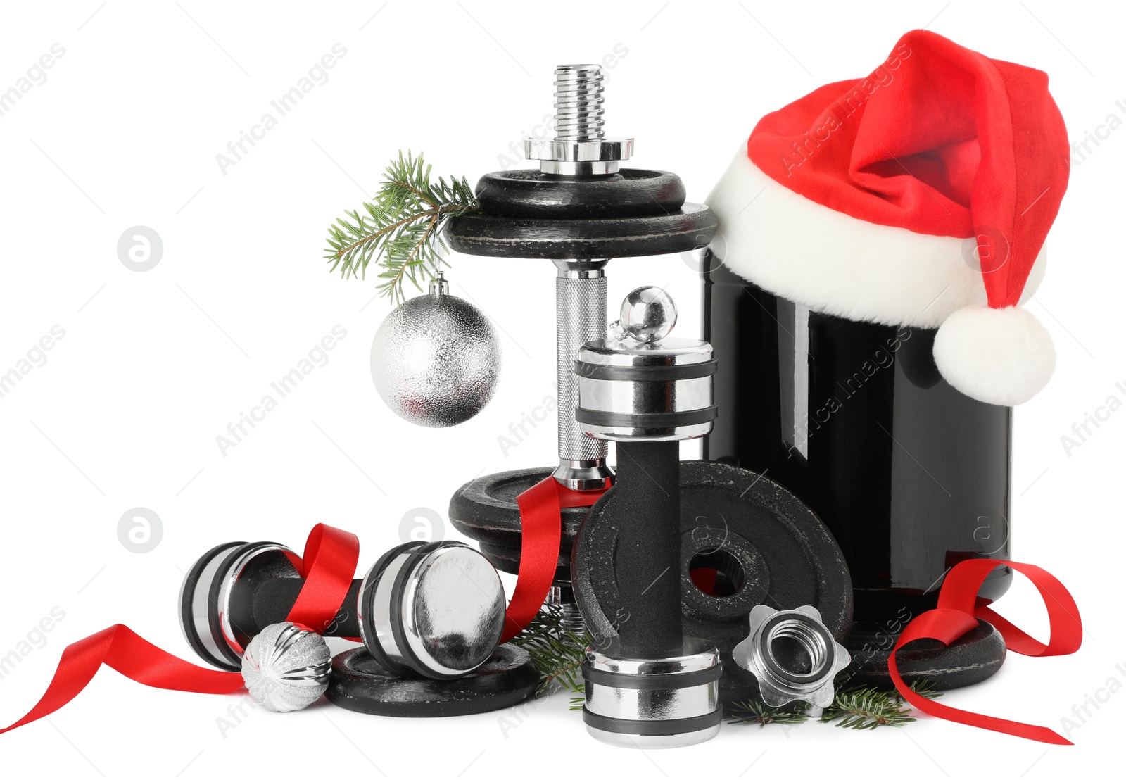 Photo of Dumbbells, container with supplement and Christmas decor isolated on white