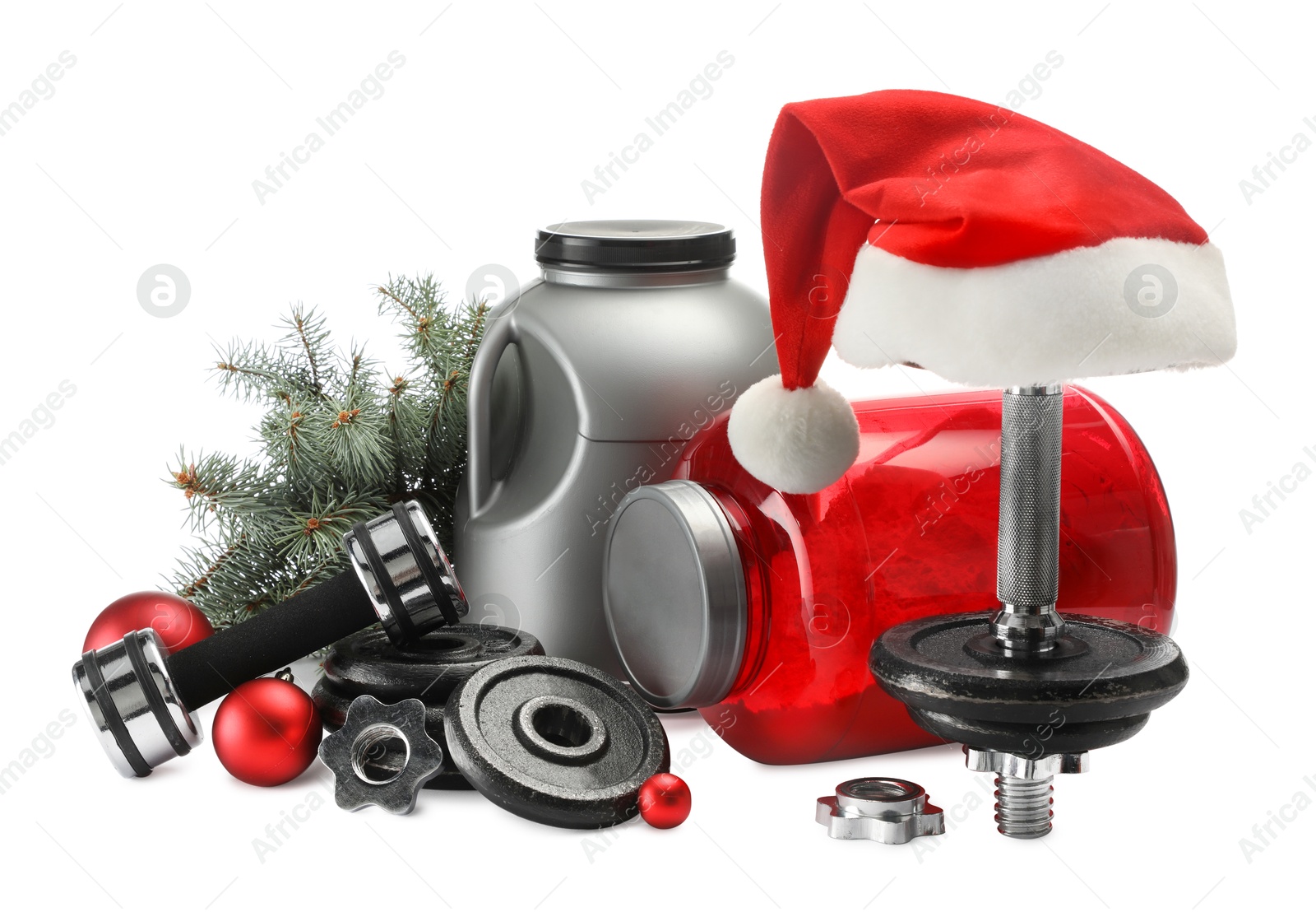 Photo of Dumbbells, containers with supplement and Christmas decor isolated on white