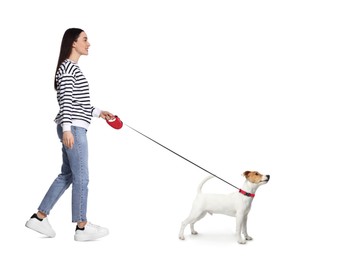 Young woman walking her dog on white background