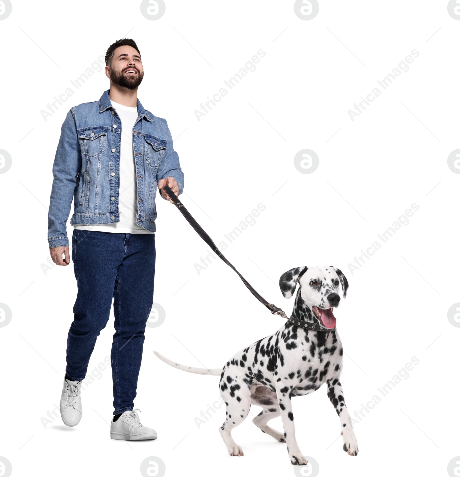 Image of Young man walking his dog on white background