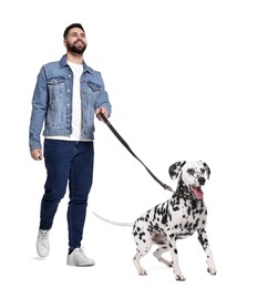 Young man walking his dog on white background