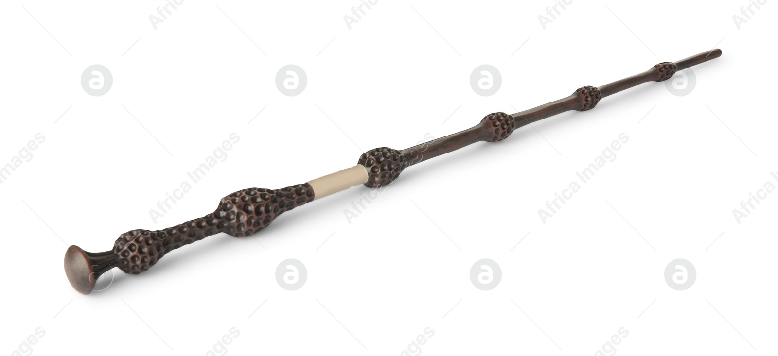 Photo of One wooden magic wand isolated on white