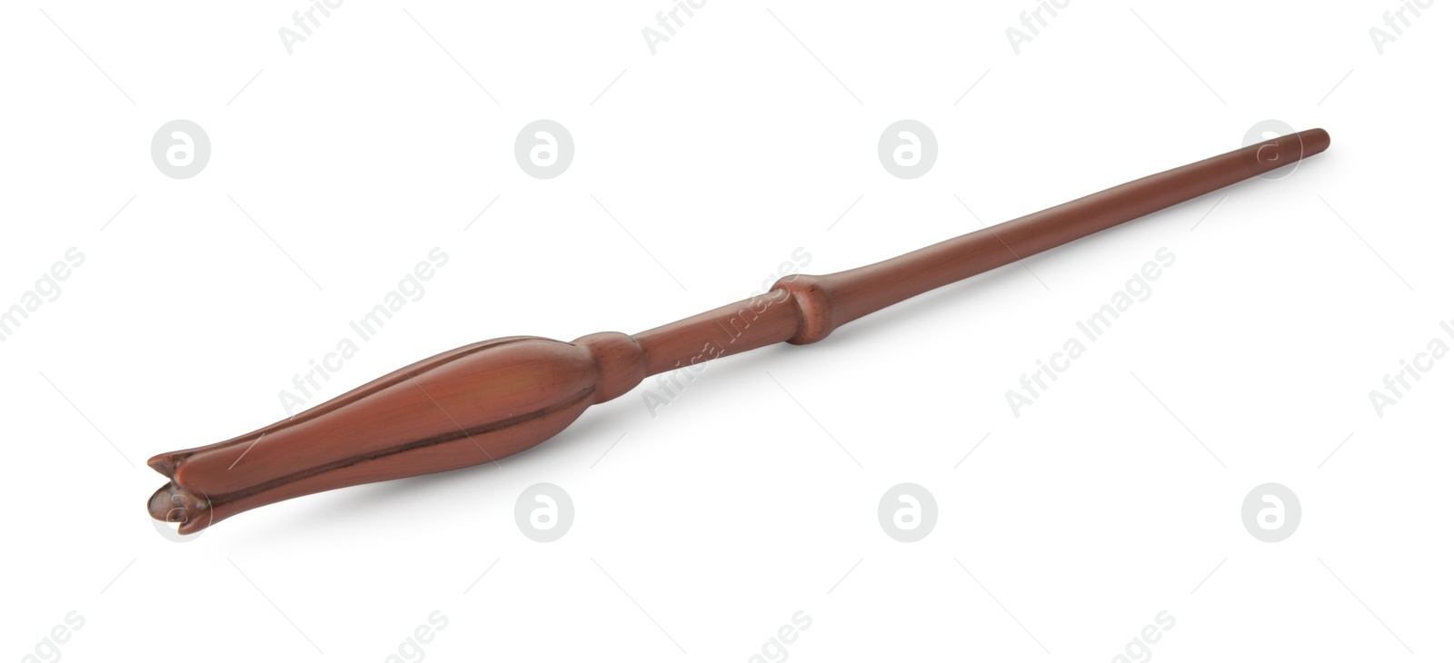 Photo of One wooden magic wand isolated on white