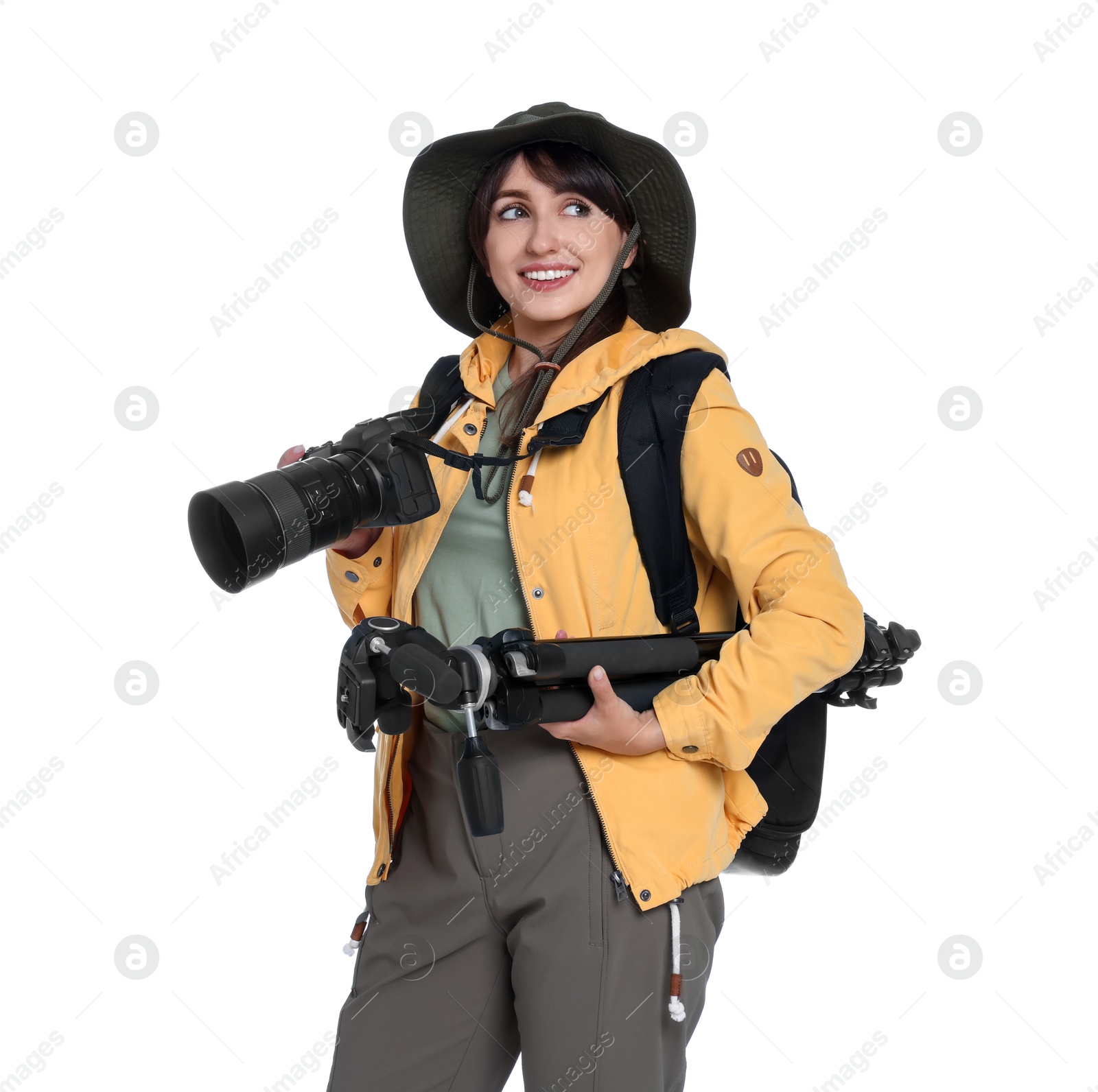 Photo of Photographer with backpack, camera and other professional equipment on white background