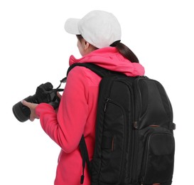 Photographer with backpack and camera on white background