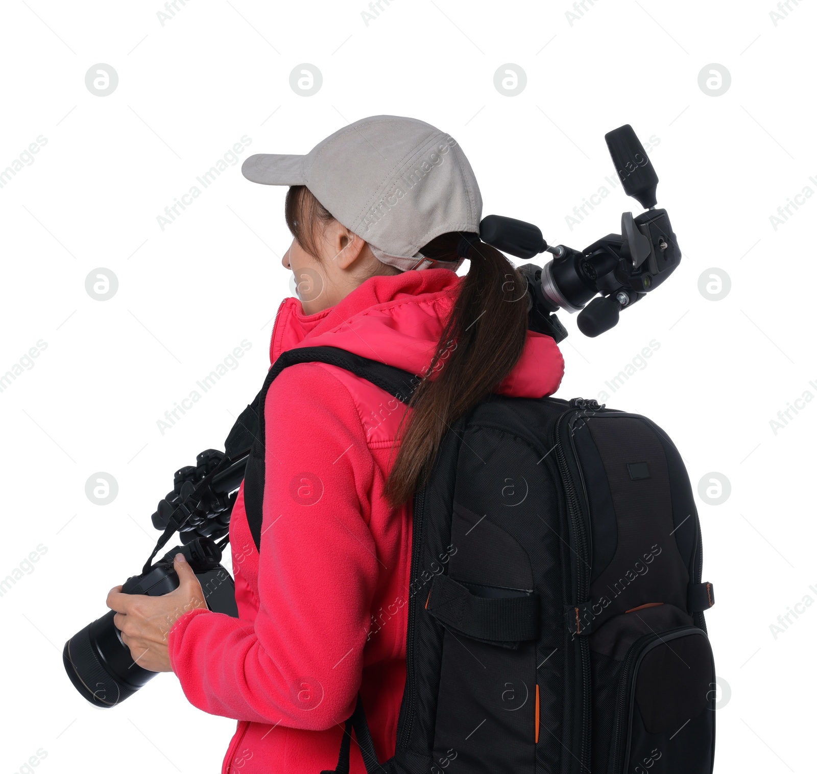 Photo of Photographer with backpack, camera and other professional equipment on white background