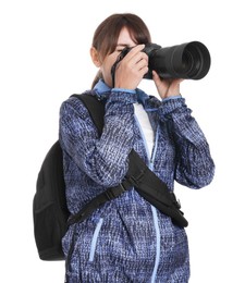 Photographer with backpack and camera taking picture on white background