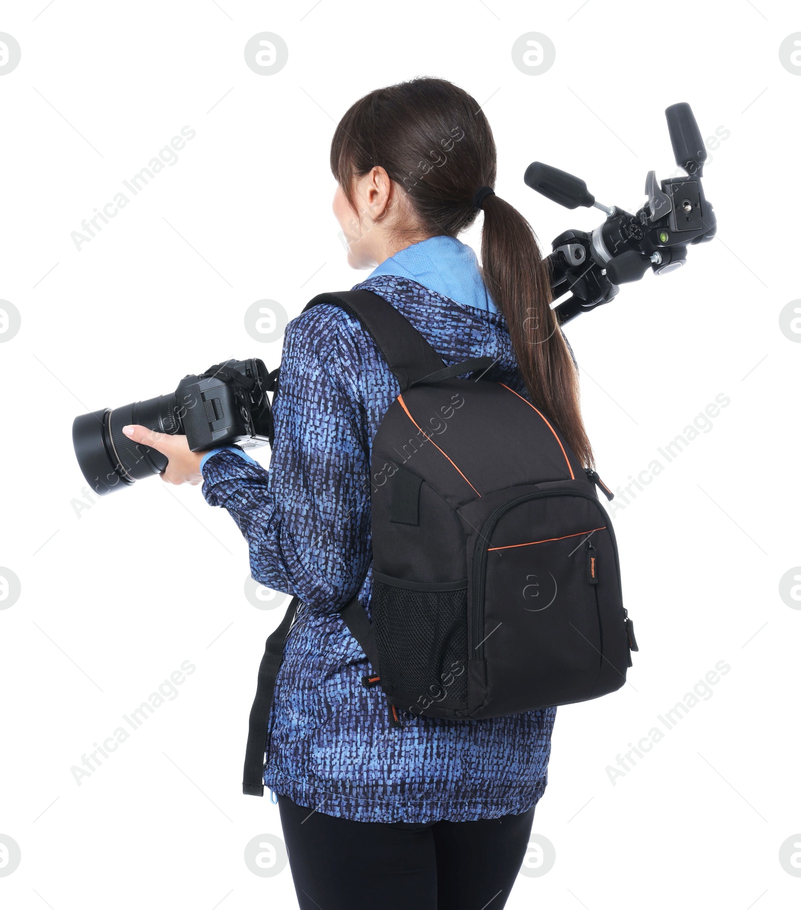 Photo of Photographer with backpack, camera and other professional equipment on white background, back view