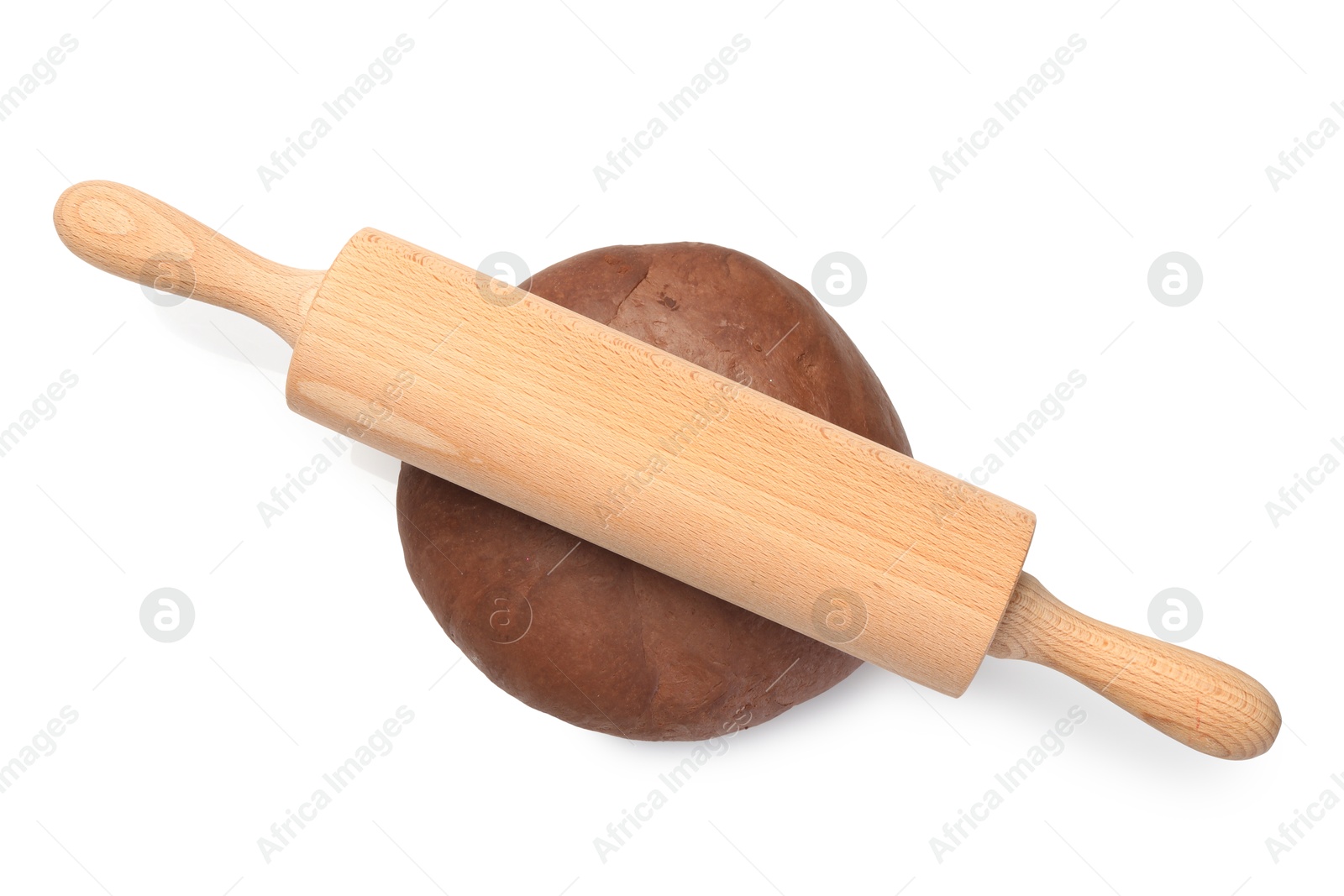 Photo of Chocolate dough and wooden rolling pin isolated on white, top view