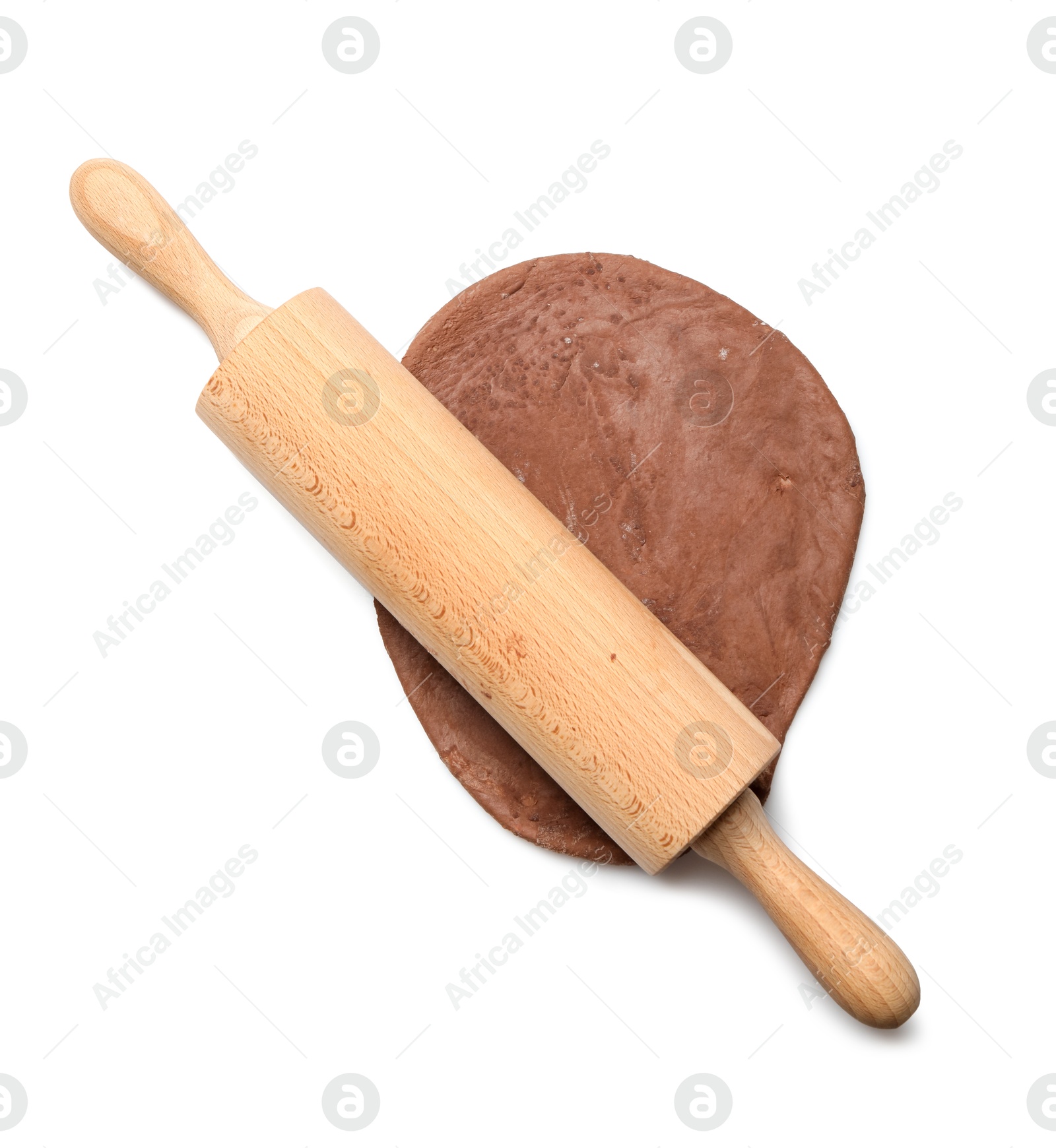 Photo of Chocolate dough and wooden rolling pin isolated on white, top view