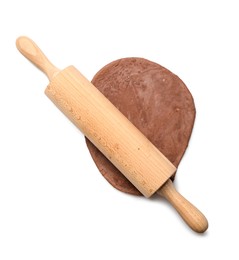 Photo of Chocolate dough and wooden rolling pin isolated on white, top view