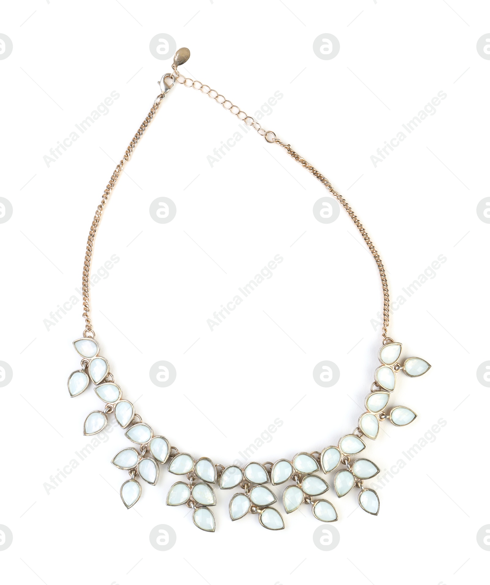 Photo of Beautiful bijouterie. Stylish necklace isolated on white, top view