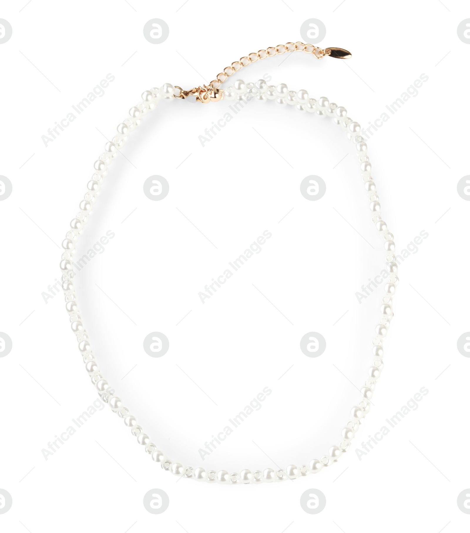 Photo of Beautiful bijouterie. Stylish necklace isolated on white, top view