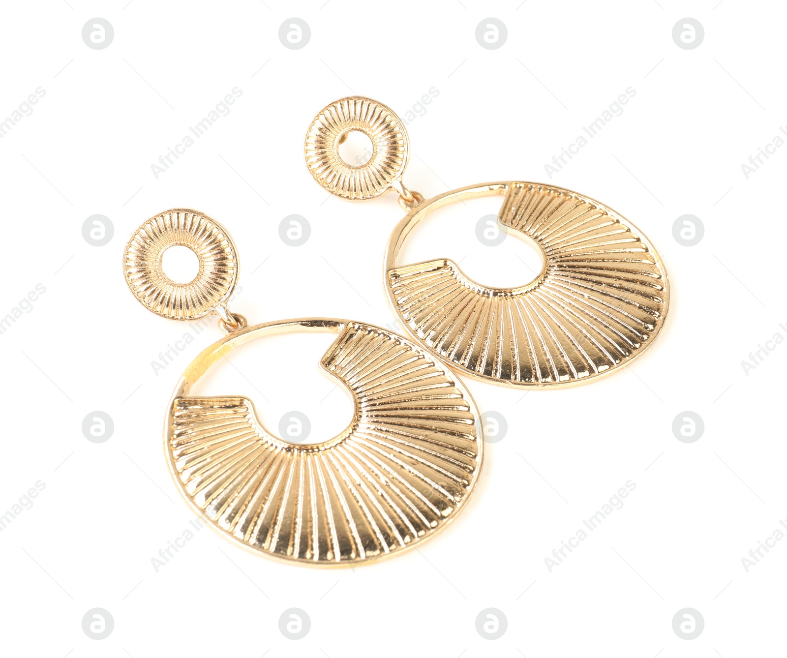 Photo of Beautiful bijouterie. Stylish earrings isolated on white