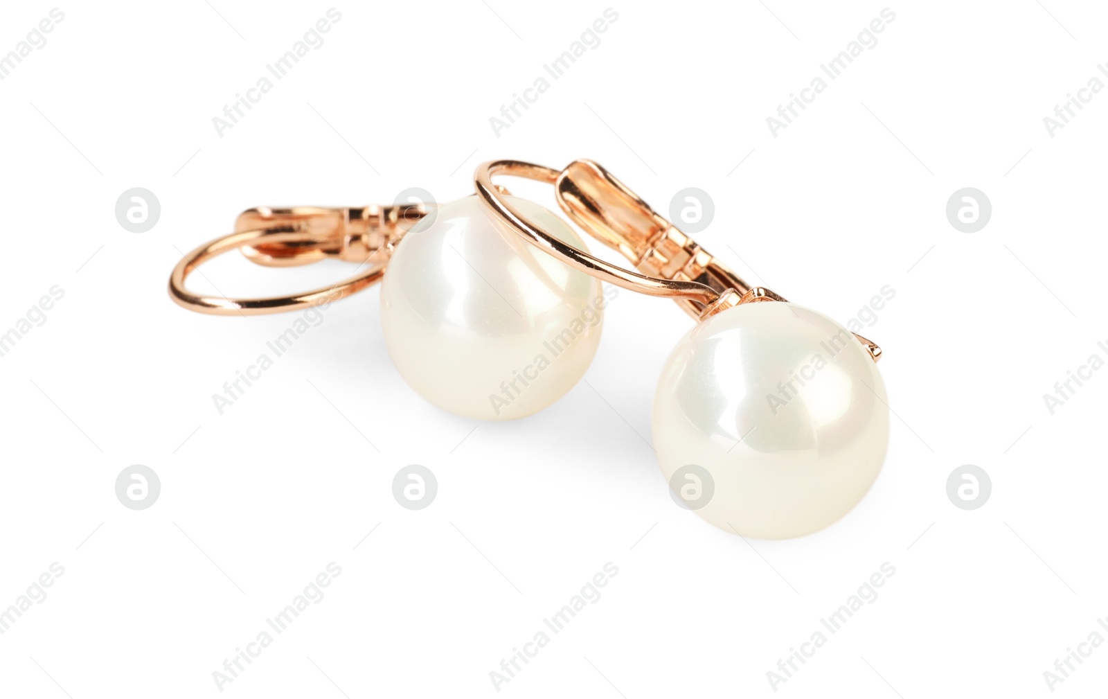 Photo of Beautiful bijouterie. Stylish earrings isolated on white