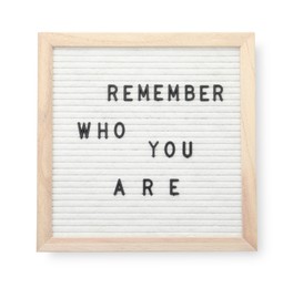 Photo of Letter board with phrase Remember who you are on white background, top view