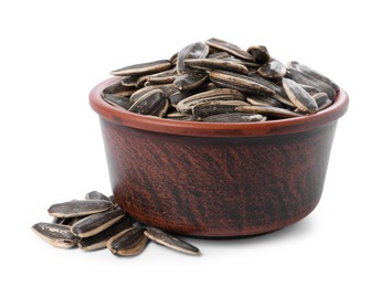 Sunflower seeds in bowl isolated on white