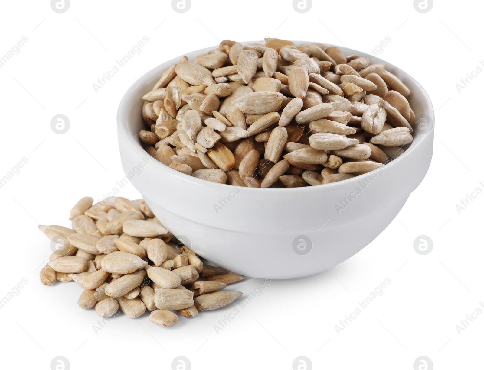 Photo of Peeled sunflower seeds in bowl isolated on white