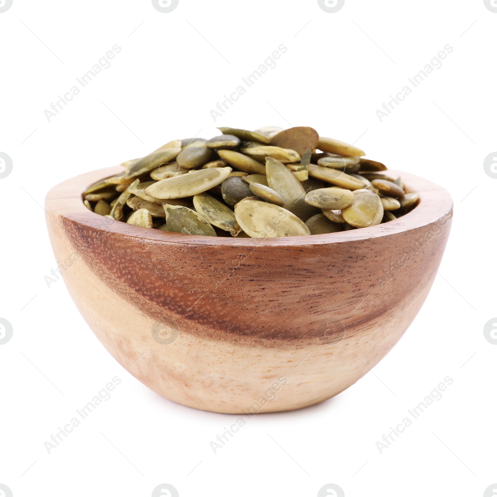 Photo of Peeled pumpkin seeds in wooden bowl isolated on white