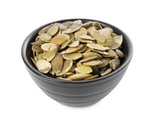 Photo of Peeled pumpkin seeds in bowl isolated on white