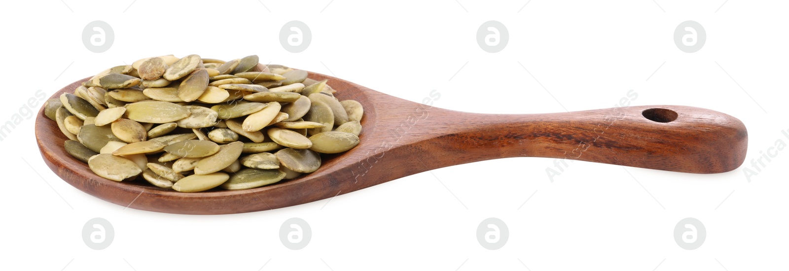 Photo of Peeled pumpkin seeds in wooden spoon isolated on white