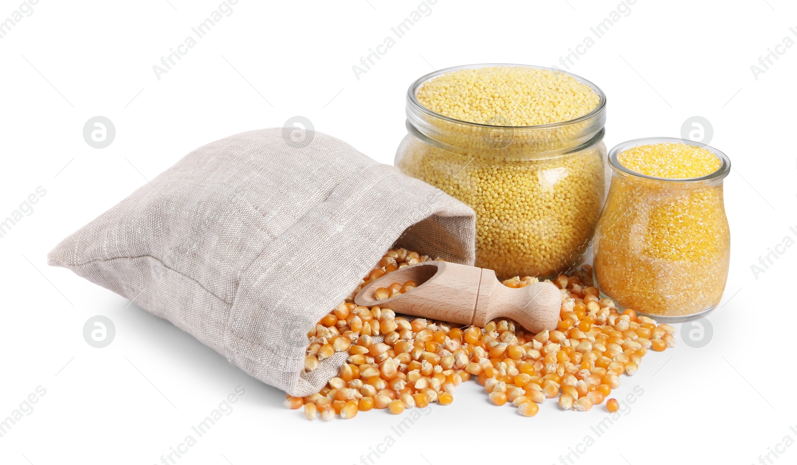 Photo of Corn kernels, millet groats and cornmeal isolated on white