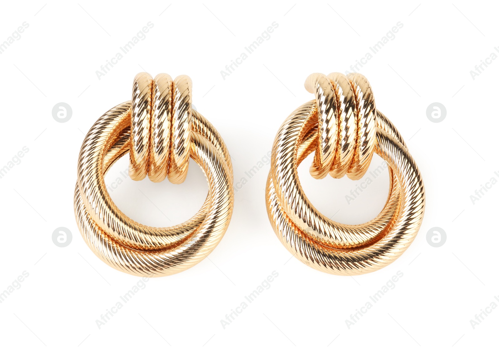 Photo of Beautiful bijouterie. Stylish earrings isolated on white