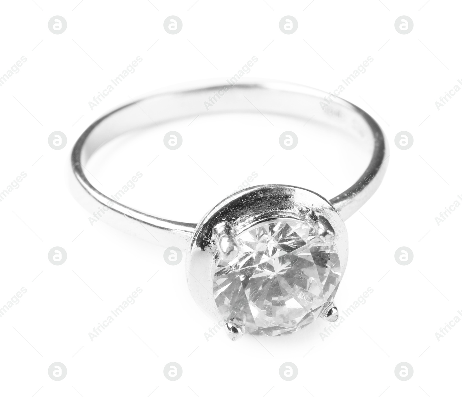 Photo of Beautiful bijouterie. Stylish ring isolated on white