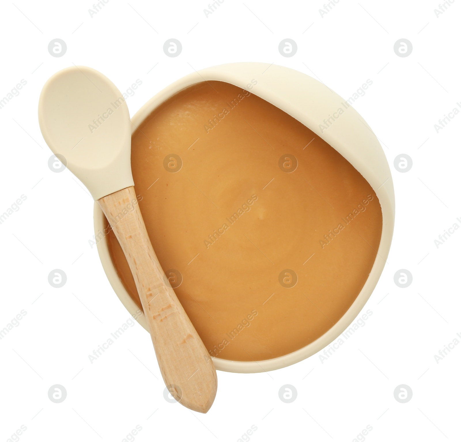 Photo of Tasty baby food in bowl and spoon isolated on white, top view