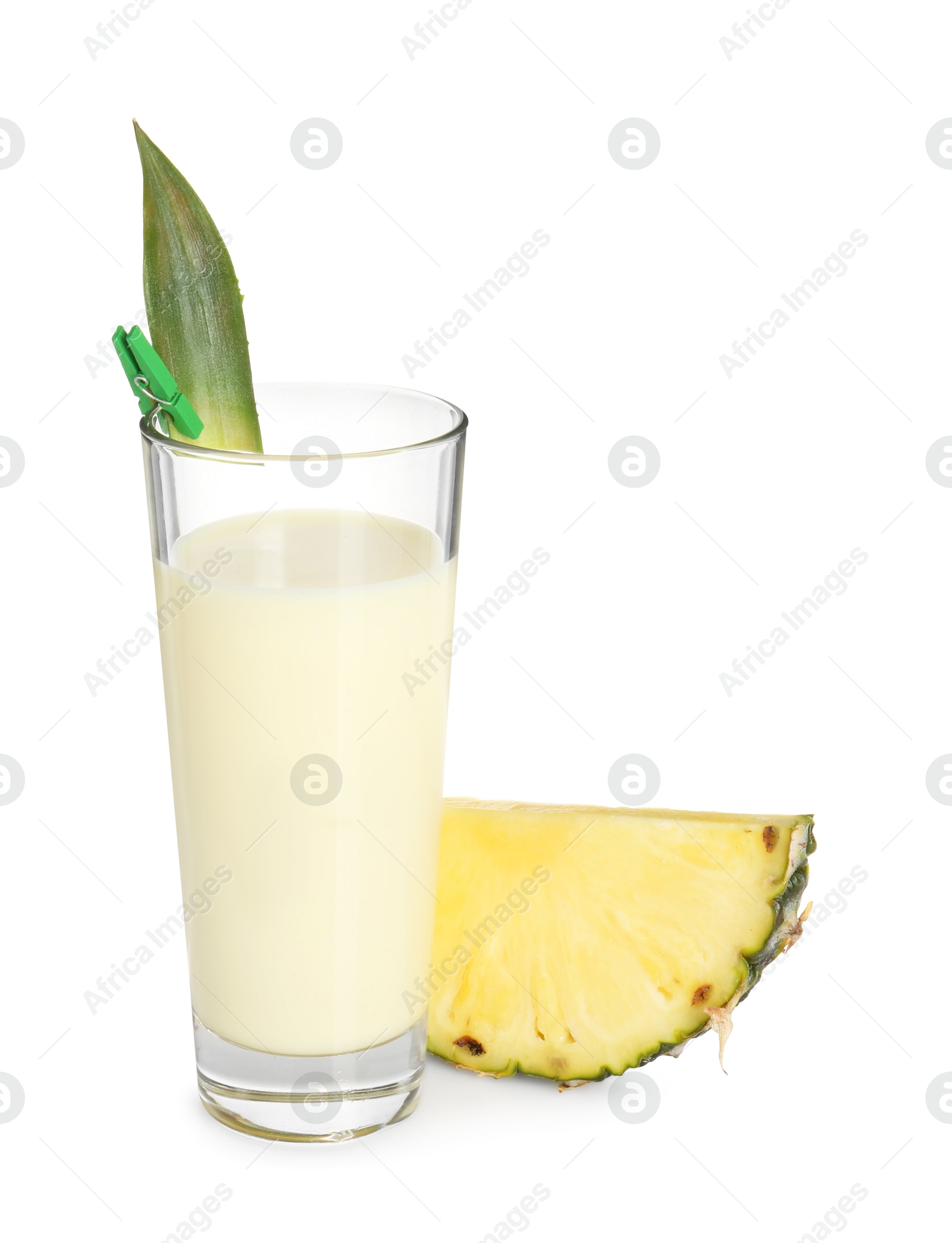 Photo of Tasty pineapple smoothie in glass and slice of fruit isolated on white