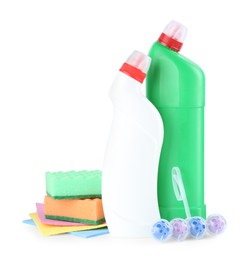 Photo of Different toilet cleaners, stack of sponges and rags isolated on white