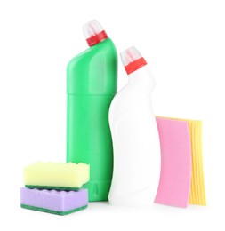 Photo of Different toilet cleaners, stack of sponges and rags isolated on white