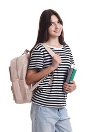 Portrait of cute teenage girl with backpack and books on white background